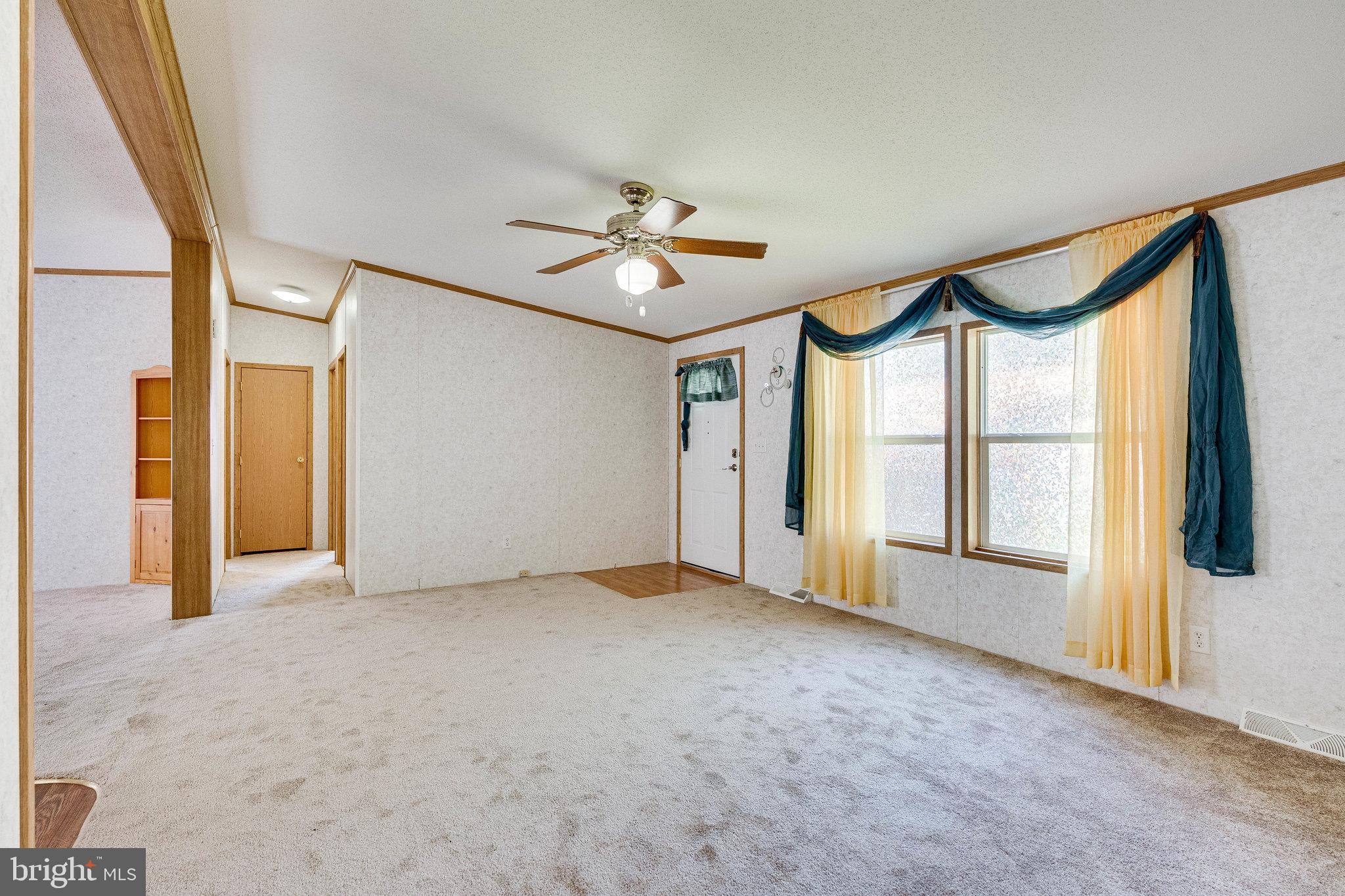 14514 Lanica Circle Chantilly, VA 20151 - Photo 3 of 37 Living room and entry foyer