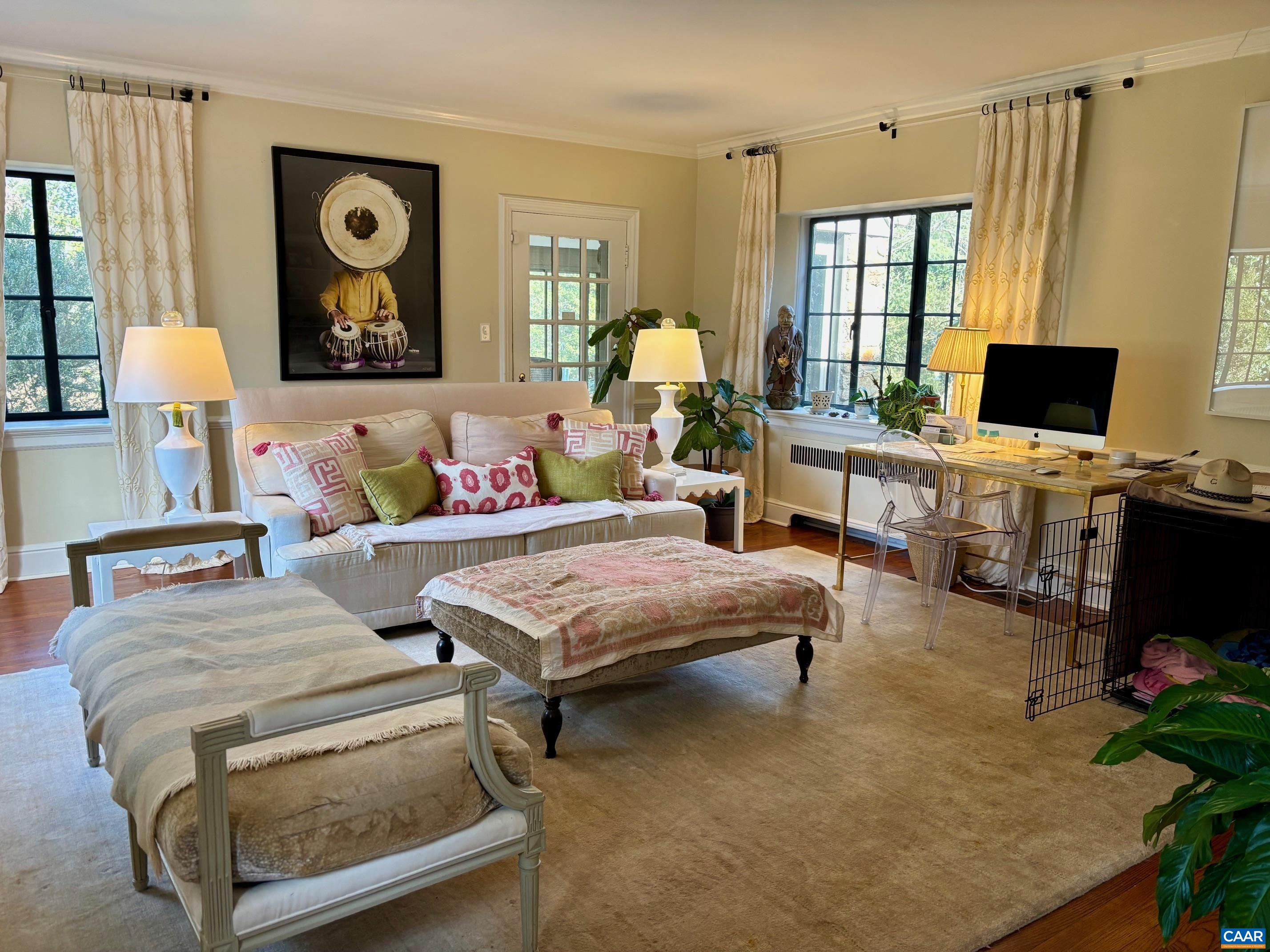 1879 Wayside Place Charlottesville, VA 22903 - Photo 2 of 13 a bedroom with a bed and wooden floor