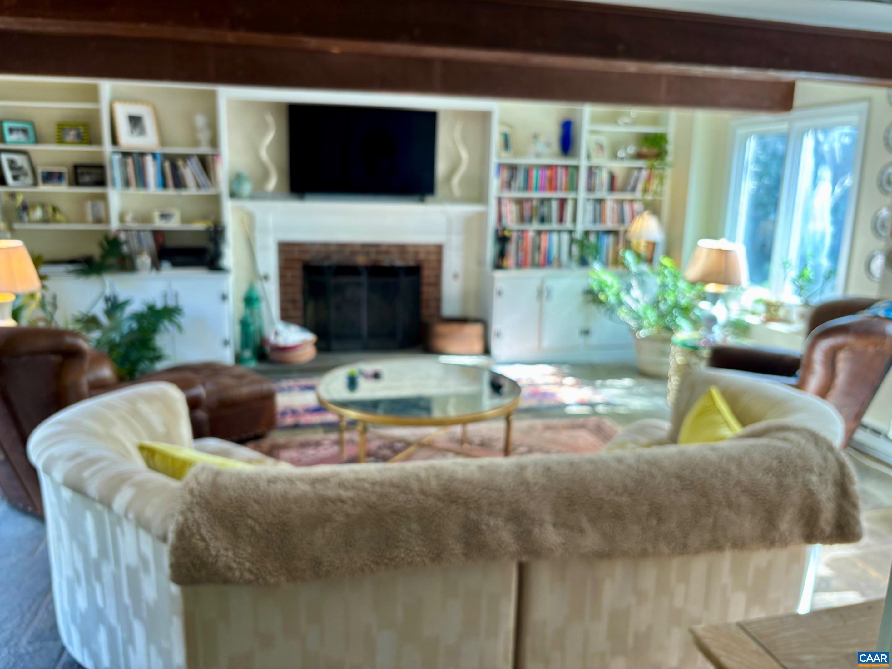 1879 Wayside Place Charlottesville, VA 22903 - Photo 4 of 13 a living room with furniture and a fireplace