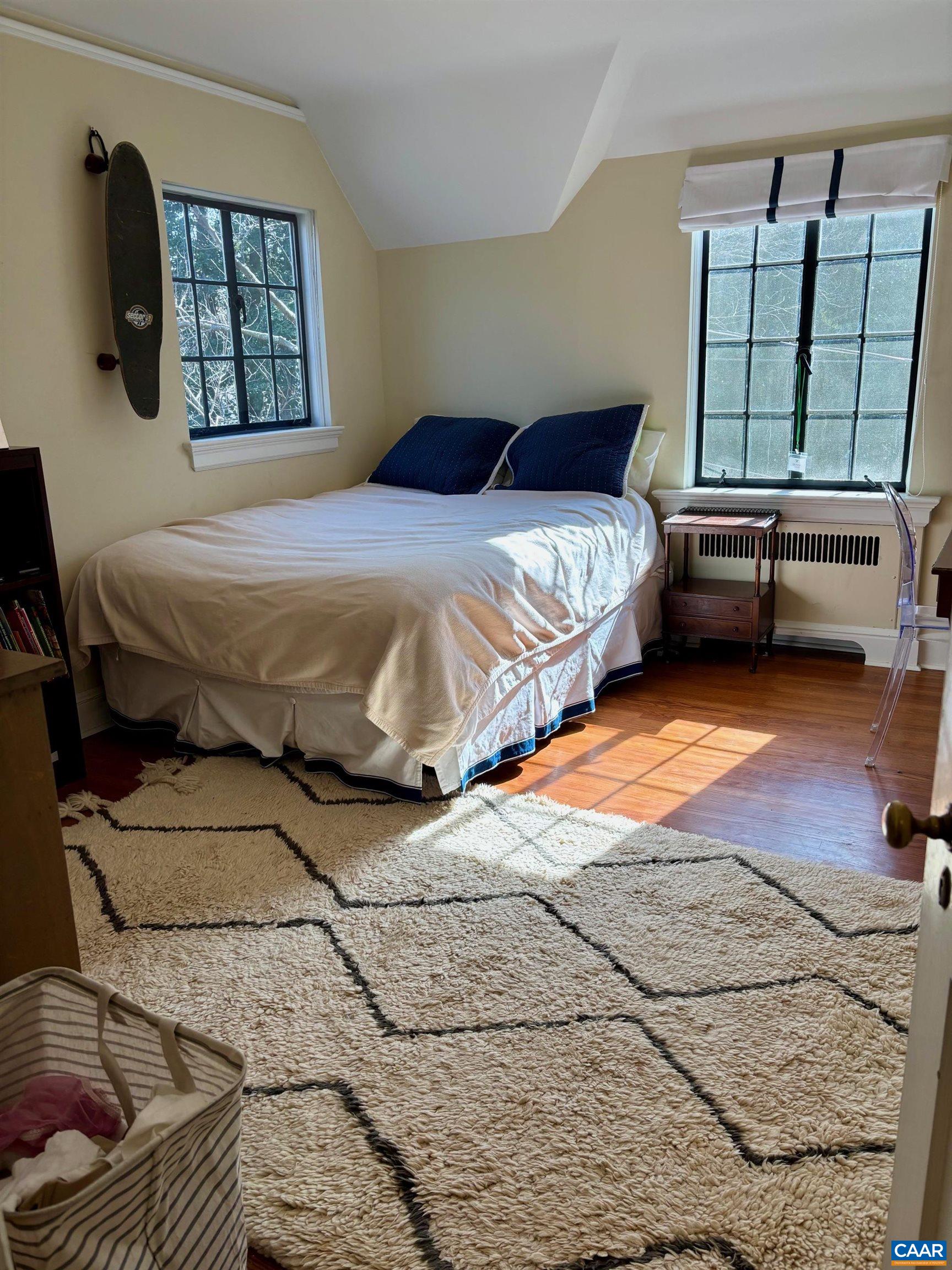 1879 Wayside Place Charlottesville, VA 22903 - Photo 8 of 13 a bedroom with a bed and window