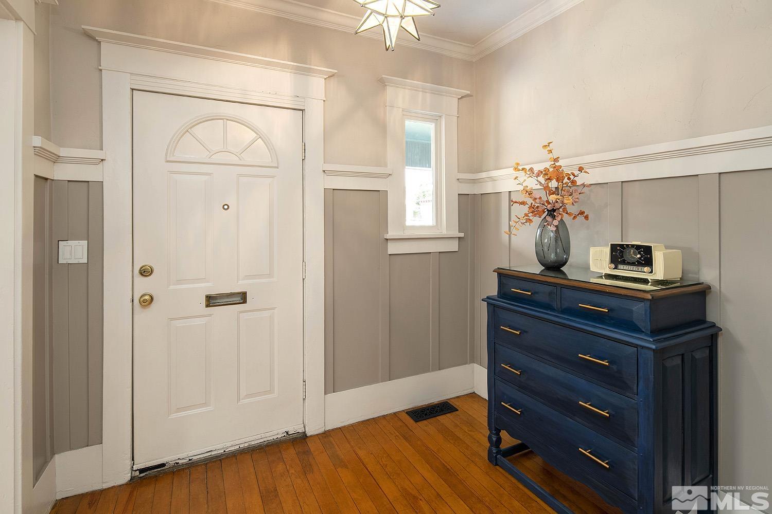 742 Plumas Street Reno, NV 89509 - Photo 11 of 40 a room with a bed and a mirror on the dresser