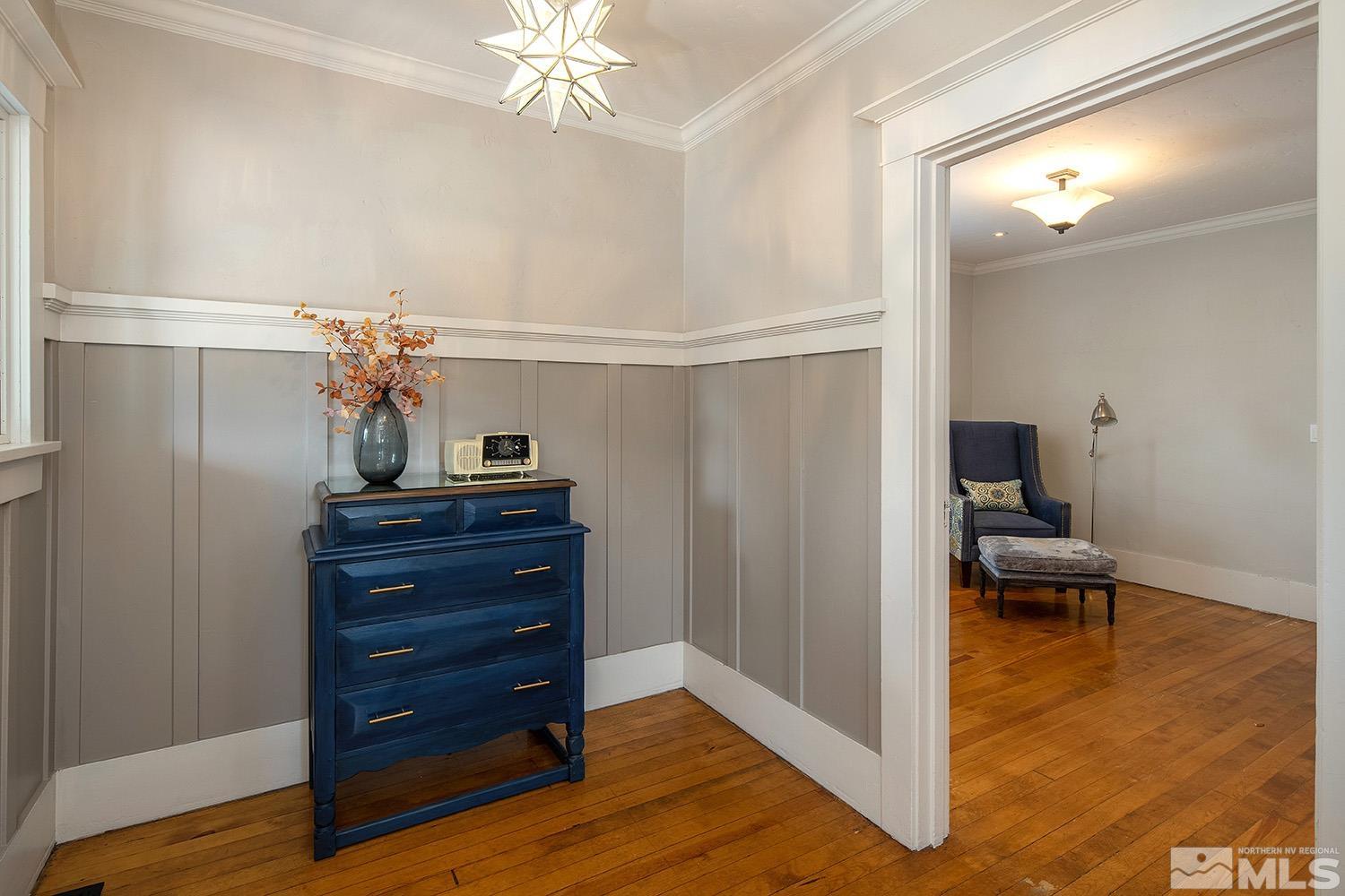 742 Plumas Street Reno, NV 89509 - Photo 12 of 40 a room that has a dresser and a mirror