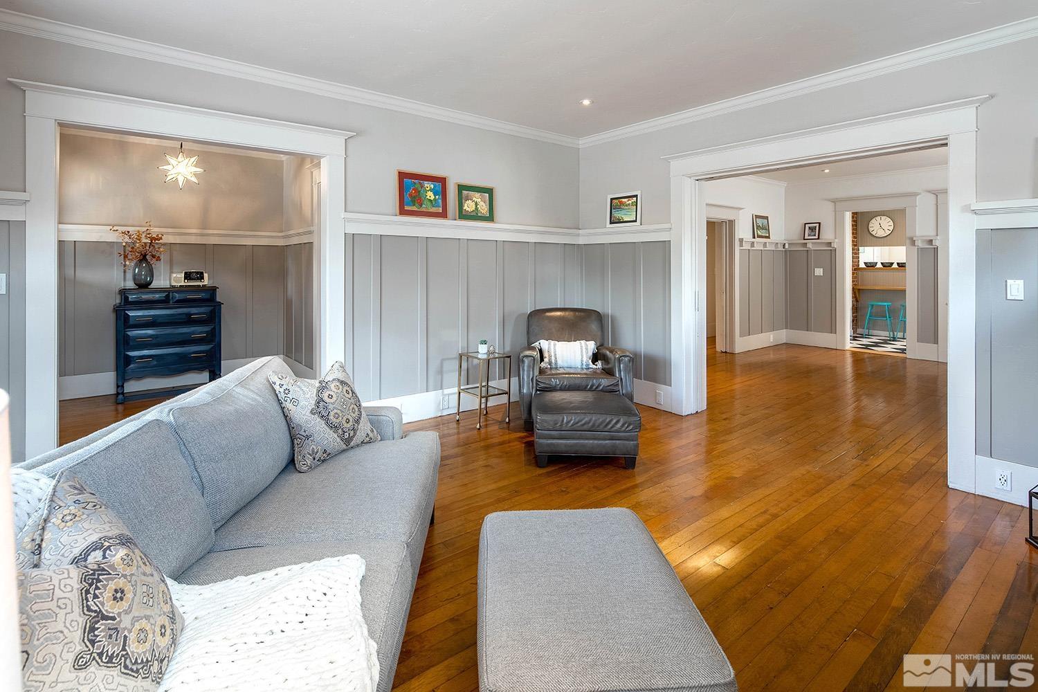 742 Plumas Street Reno, NV 89509 - Photo 13 of 40 a living room with furniture and a wooden floor