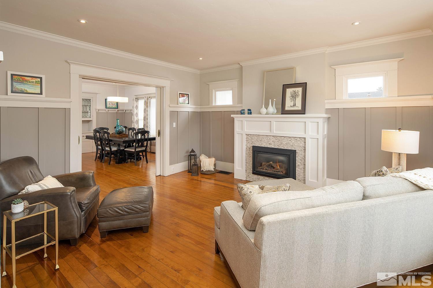 742 Plumas Street Reno, NV 89509 - Photo 14 of 40 a bedroom with furniture and a fireplace