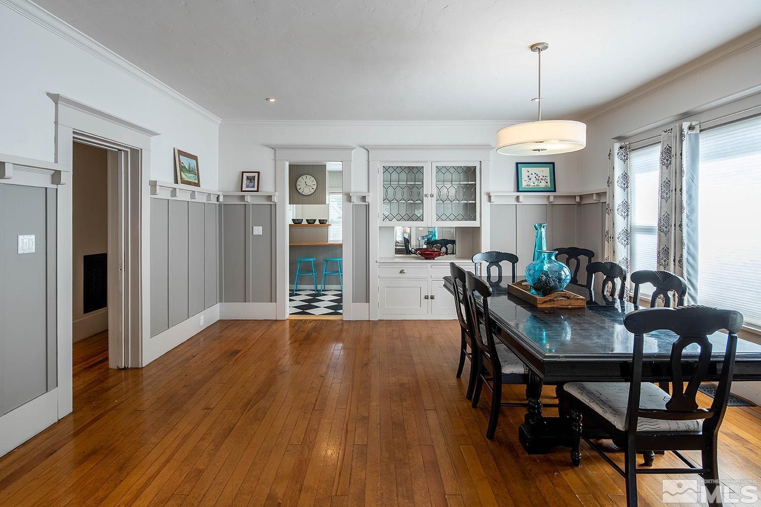 742 Plumas Street Reno, NV 89509 - Photo 17 of 40 a view of a dining room with furniture window and wooden floor