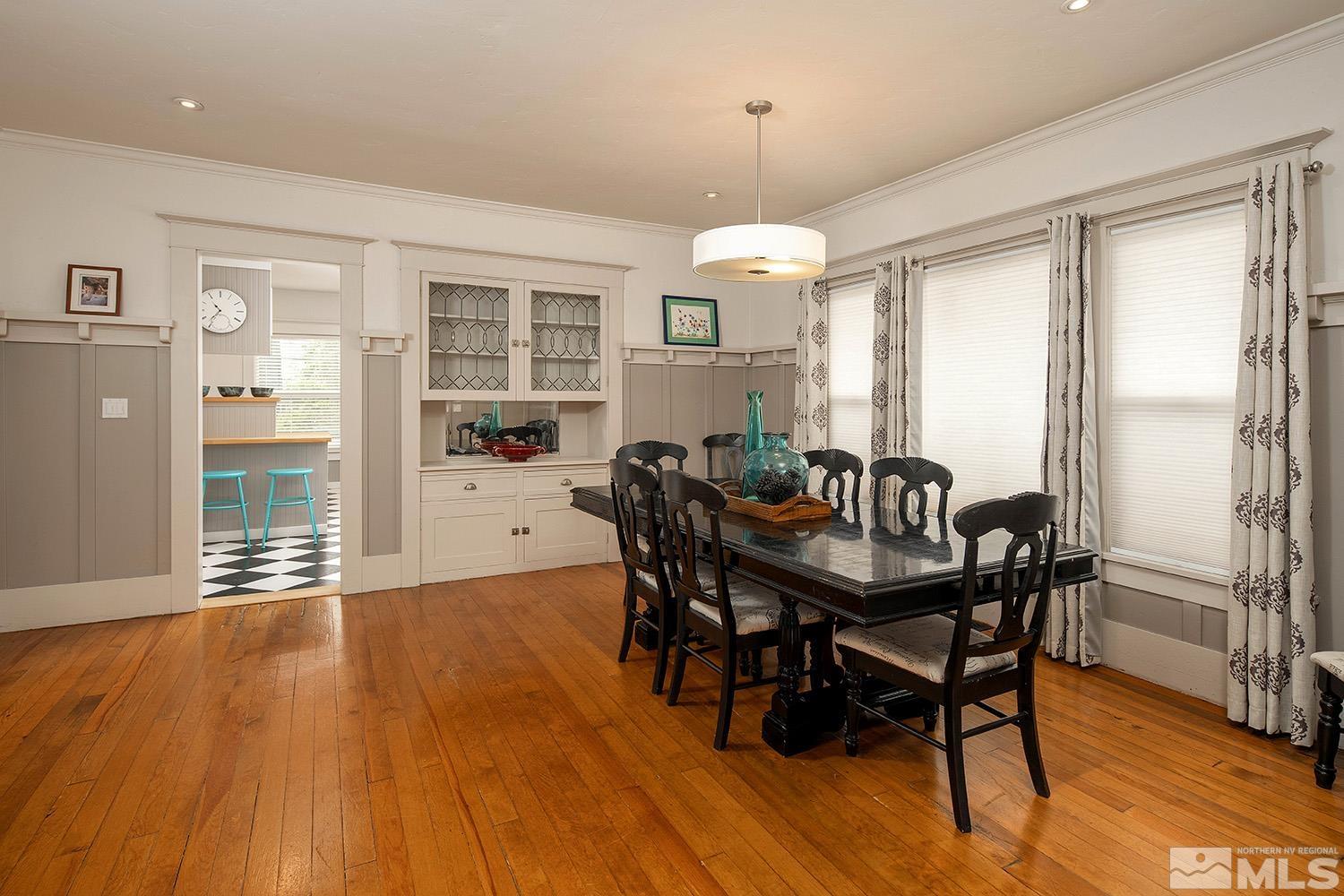 742 Plumas Street Reno, NV 89509 - Photo 18 of 40 a view of a dining room with furniture window and wooden floor