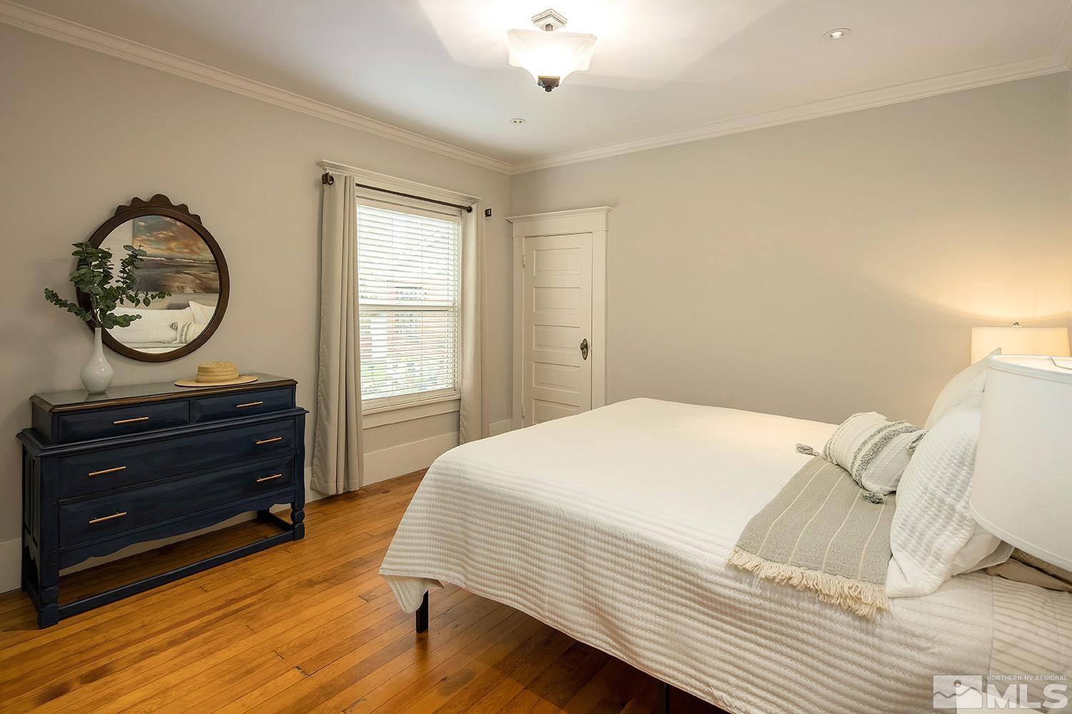 742 Plumas Street Reno, NV 89509 - Photo 26 of 40 a bedroom with a bed and a closet