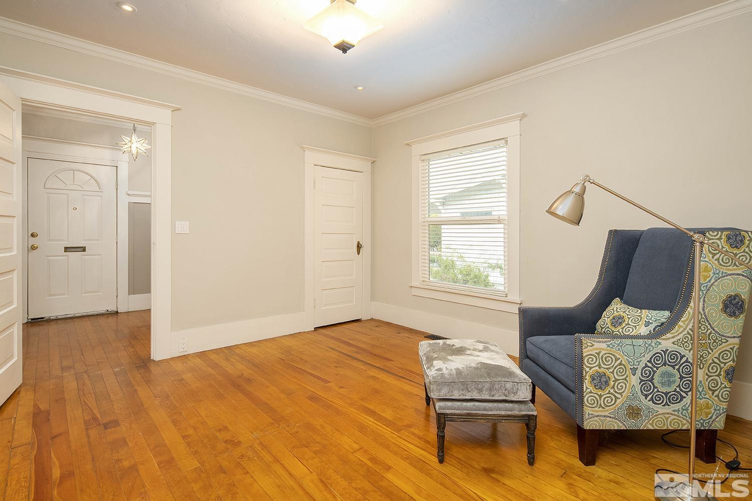 742 Plumas Street Reno, NV 89509 - Photo 28 of 40 a bedroom with furniture and wooden floor