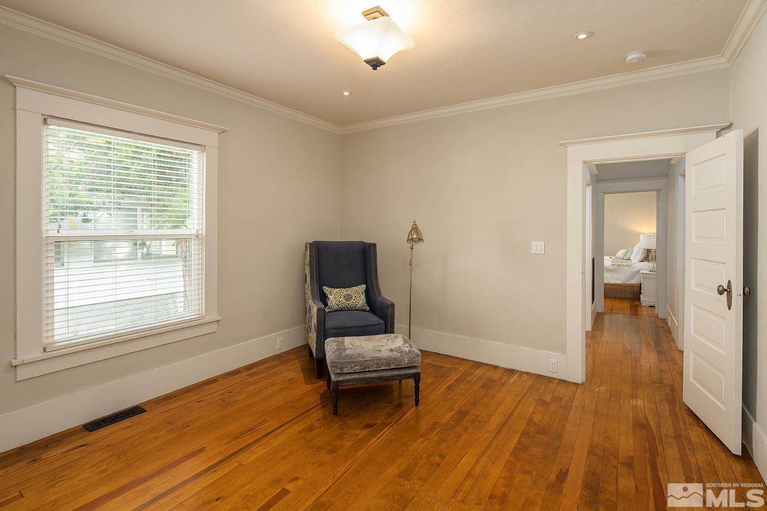 742 Plumas Street Reno, NV 89509 - Photo 29 of 40 a living room with a chair and a window