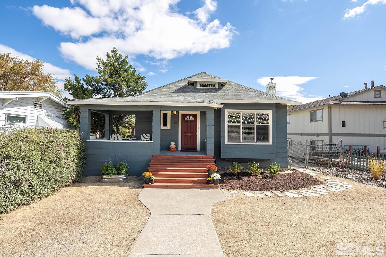 742 Plumas Street Reno, NV 89509 - Photo 7 of 40 a front view of a house with a porch