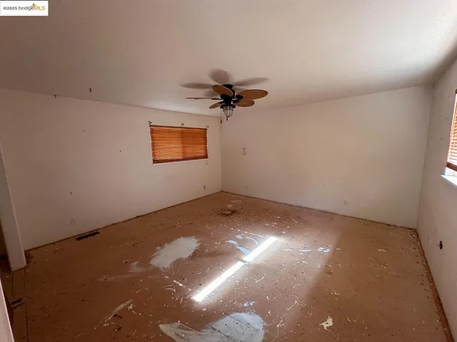 a view of a big room with carpet