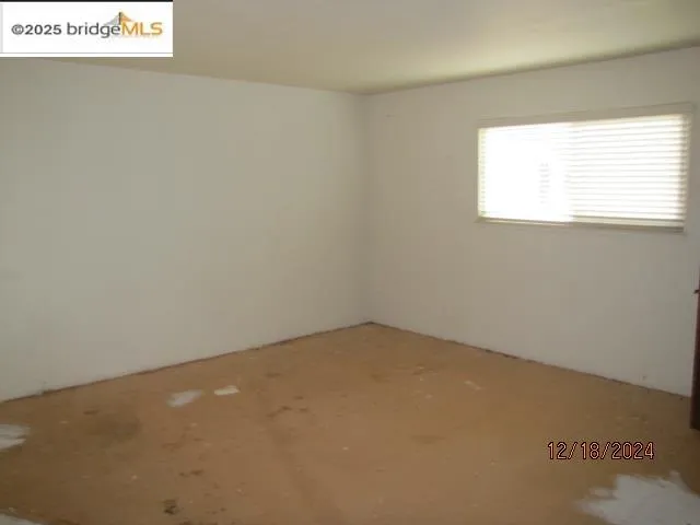 a white bath tub sitting in a bathroom