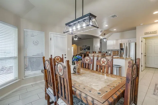 a view of a dining room with furniture
