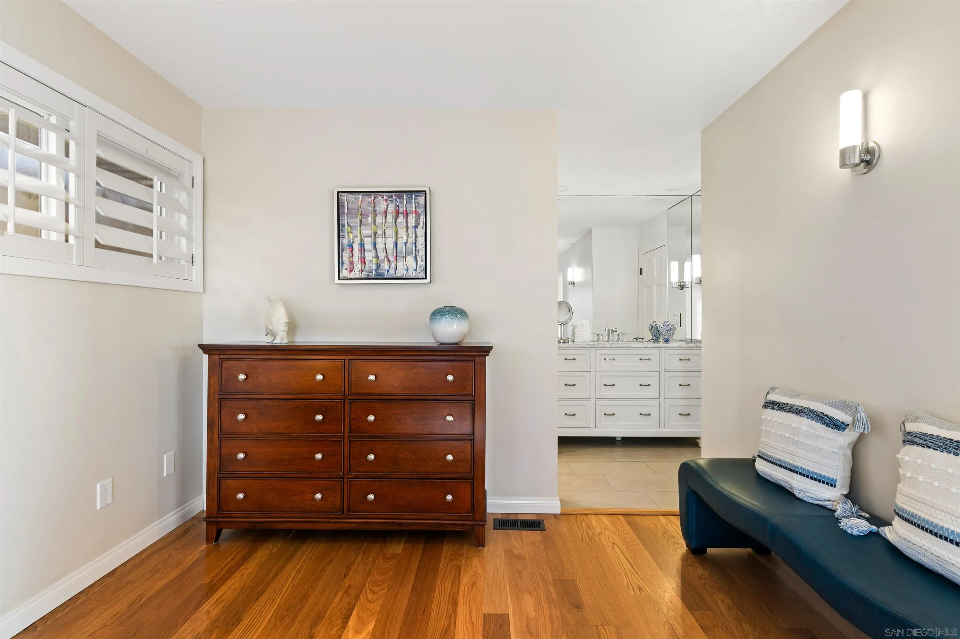 253 Gravilla Street La Jolla, CA 92037 - Photo 12 of 34 a view of bedroom with a bed and wooden floor