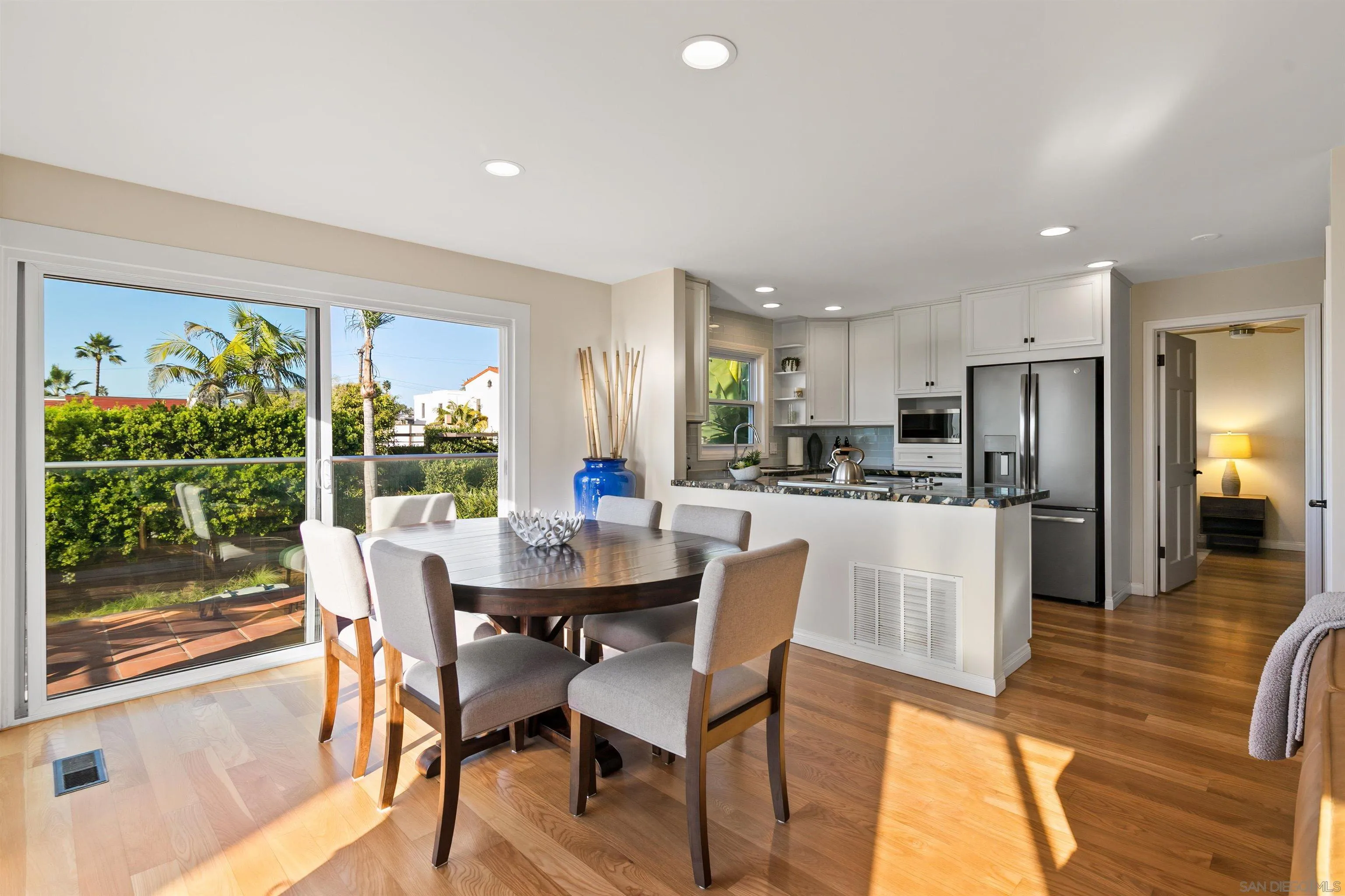 253 Gravilla Street La Jolla, CA 92037 - Photo 3 of 34 a view of a dining room with furniture window and wooden floor
