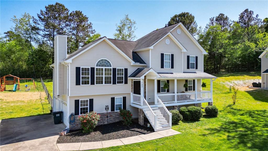 127 Long Ridge Drive Southeast Calhoun, GA 30701 - Photo 1 of 1 a view of a yard in front of house