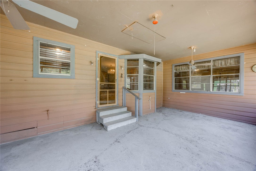 9047 County Road 461 Mathis, TX 78368 - Photo 15 of 38 an empty room with windows