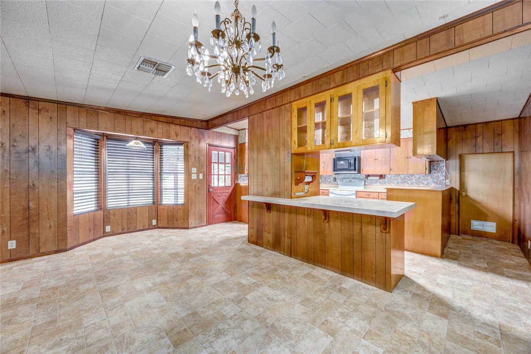 9047 County Road 461 Mathis, TX 78368 - Photo 25 of 38 a large kitchen with a large window