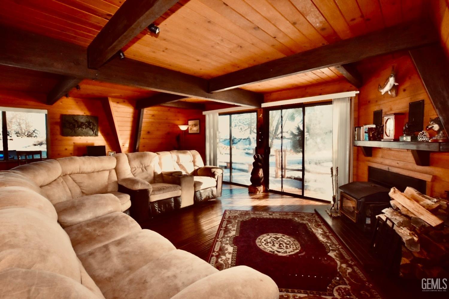 Undisclosed Address Tehachapi, CA 93561 - Photo 11 of 17 a living room with furniture and a large window