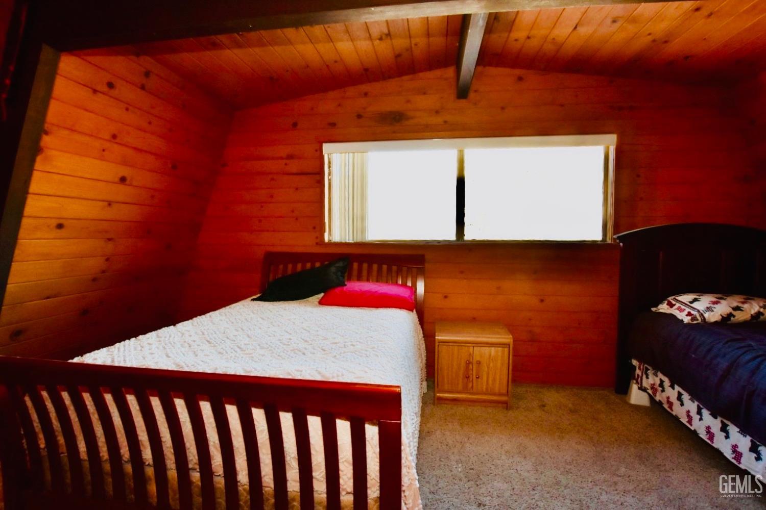 Undisclosed Address Tehachapi, CA 93561 - Photo 13 of 17 a bedroom with a bed and a dresser