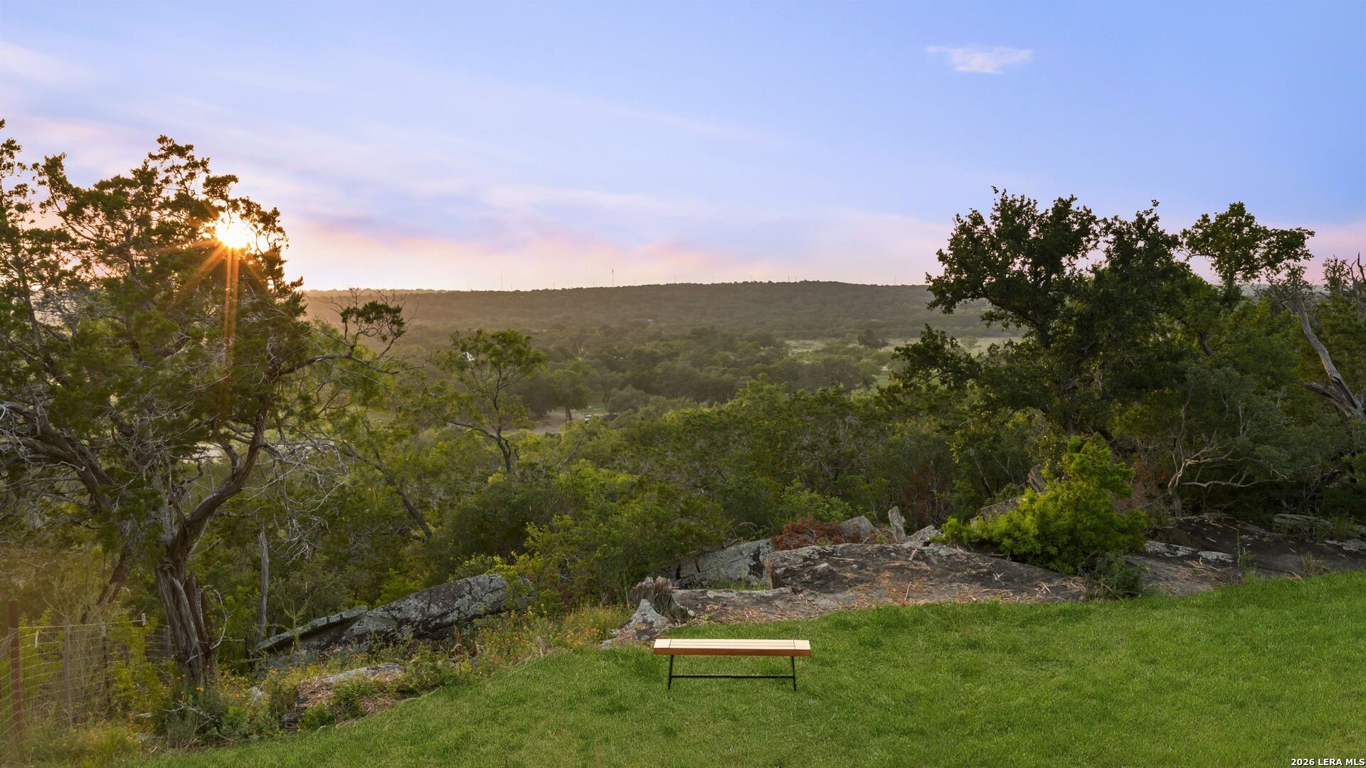 3402 Mormon Mill Road Marble Falls, TX 78654 - Photo 6 of 29 a view of a house with a yard and sitting area