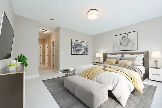 a bed room with a bed and a couch