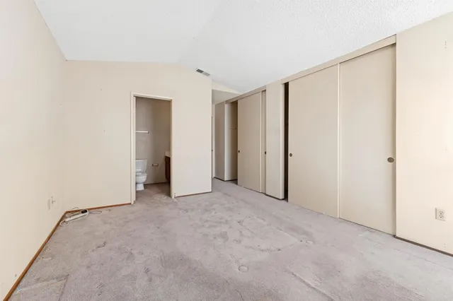 an empty room with closet