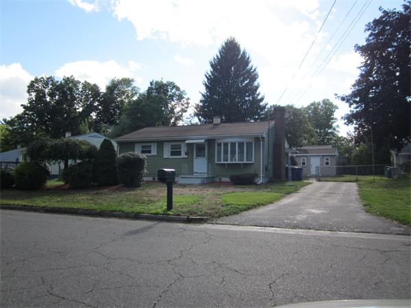 34 Redden Road Springfield, MA 01119 - Photo 1 of 20 a front view of house with a yard and green space