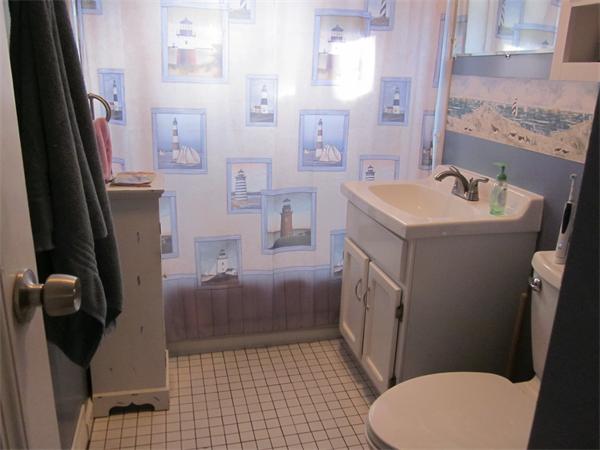 34 Redden Road Springfield, MA 01119 - Photo 11 of 20 a bathroom with a sink a toilet and shower