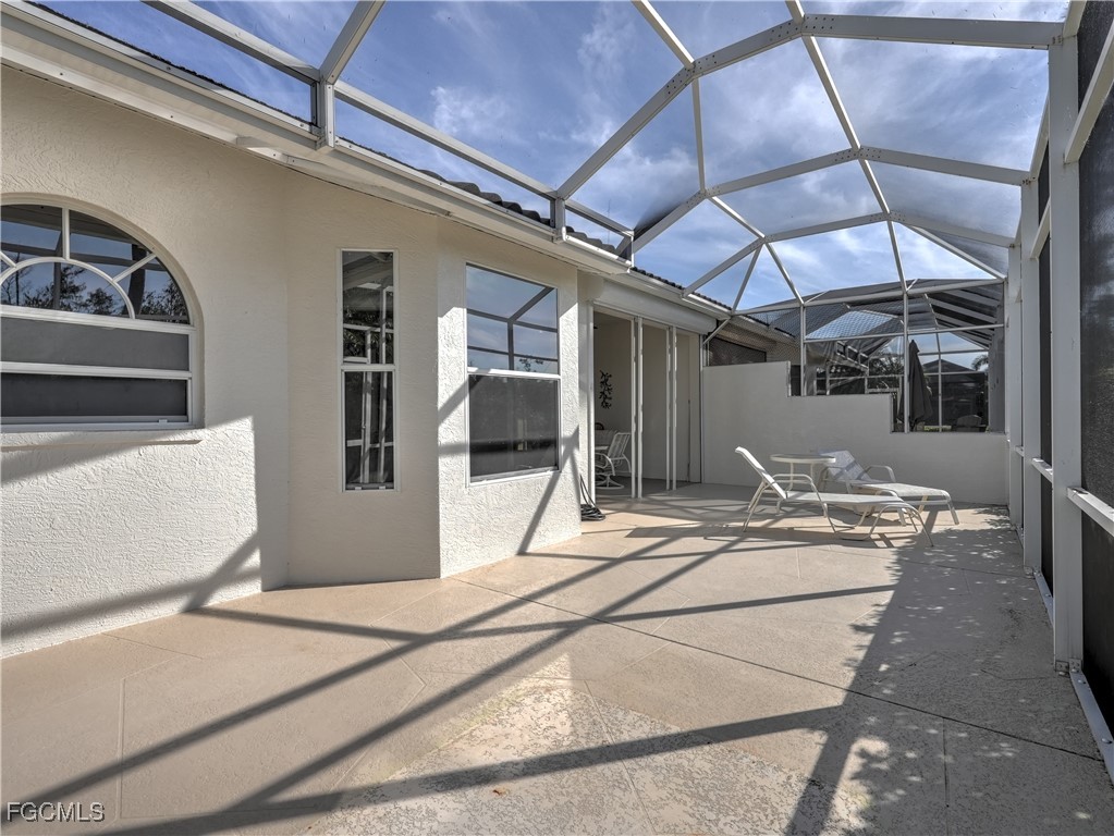 11180 Wine Palm Road Fort Myers, FL 33966 - Photo 33 of 40 a room with gym equipment and a stove