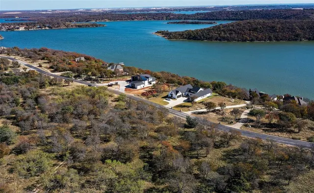 a view of a backyard of the house