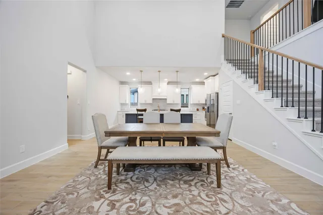 a view of a dining room with furniture
