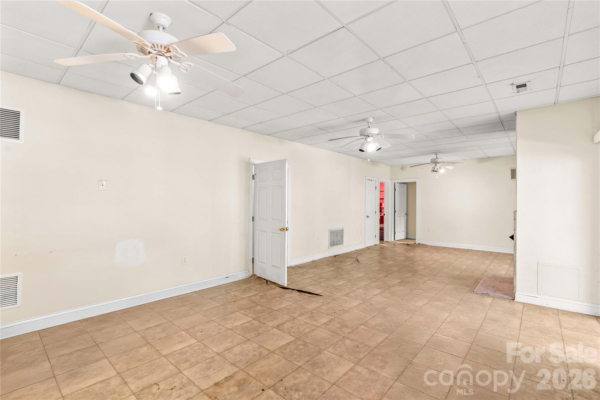 711 Spring Pointe Drive Stony Point, NC 28678 - Photo 24 of 47 a view of a livingroom with a chandelier fan