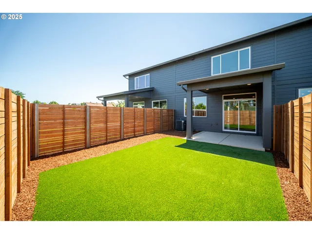 a view of a backyard with a garden