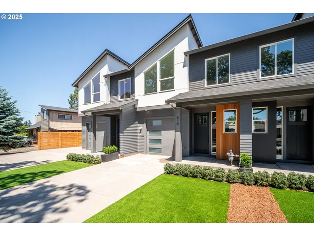 a view of a yard in front of a house