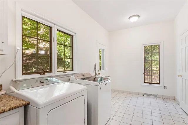 a view of a bathroom with a sink and a window