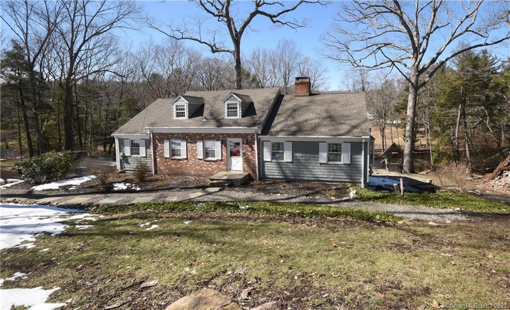 22 Valley Forge Road Weston, CT 06883 - Photo 1 of 1 a view of a house with a sink and yard