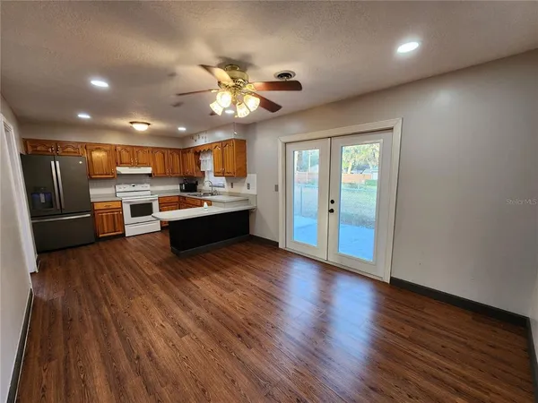 a hallway with washer and dryer