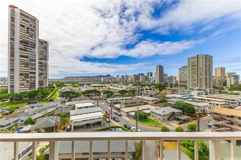 a view of a city with tall buildings