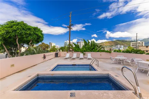 a view of swimming pool with seating
