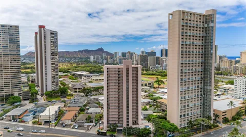 a view of a city with tall buildings