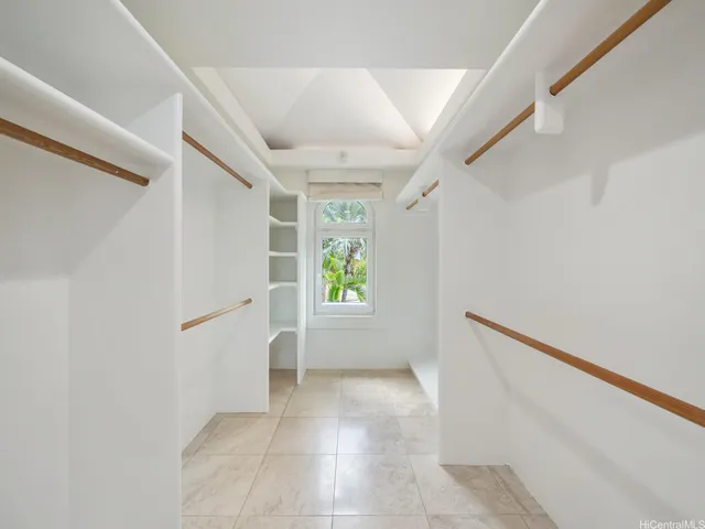 a view of room with window and hardwood floor