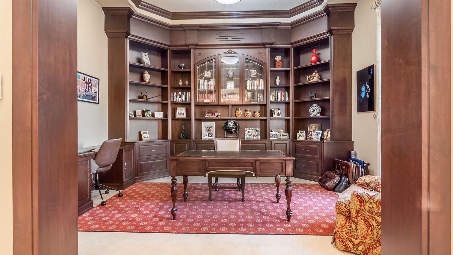 17384 Vistancia Circle Boca Raton, FL 33496 - Photo 12 of 27 a view of a livingroom with furniture and a bookshelf