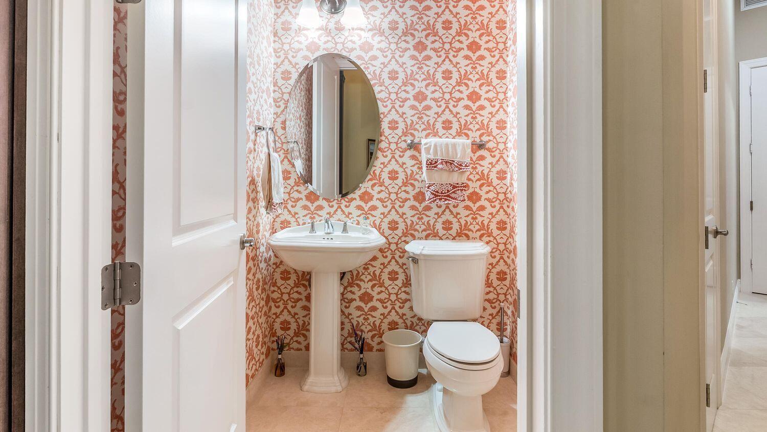 17384 Vistancia Circle Boca Raton, FL 33496 - Photo 16 of 27 a bathroom with a toilet sink and mirror