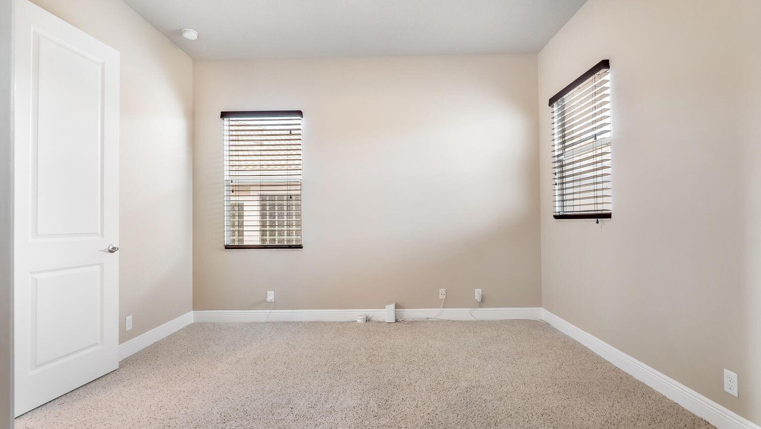 17384 Vistancia Circle Boca Raton, FL 33496 - Photo 18 of 27 an empty room with windows