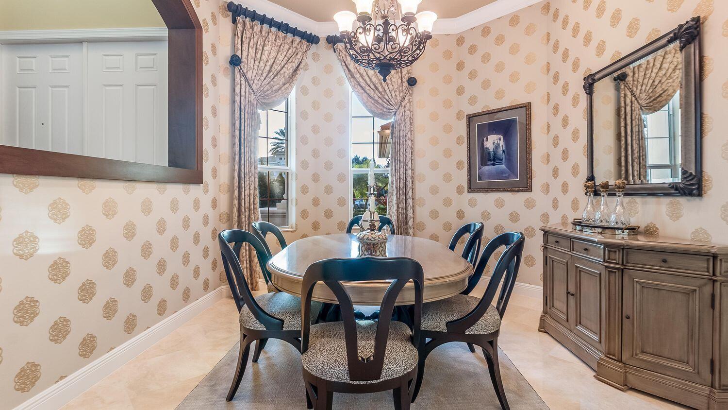 17384 Vistancia Circle Boca Raton, FL 33496 - Photo 5 of 27 a view of a dining room with furniture and wooden floor