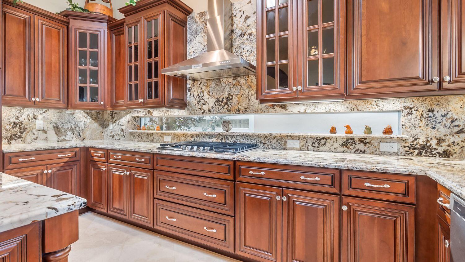 17384 Vistancia Circle Boca Raton, FL 33496 - Photo 8 of 27 a kitchen with granite countertop stainless steel appliances sink and cabinets