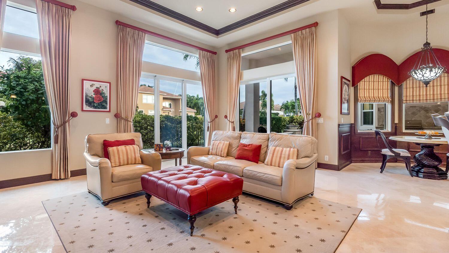17384 Vistancia Circle Boca Raton, FL 33496 - Photo 10 of 27 a living room with furniture a couch and large windows