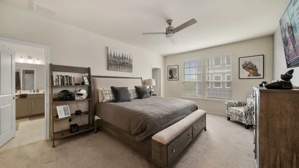 a bed room with a bed and furniture