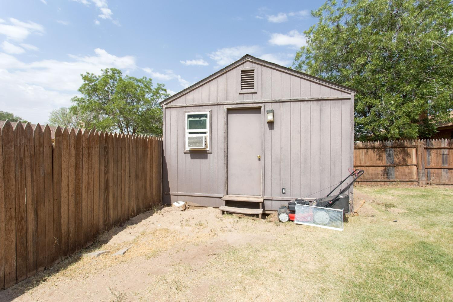 6015 14th Street Lubbock, TX 79416 - Photo 20 of 24 Storage shed with electricity